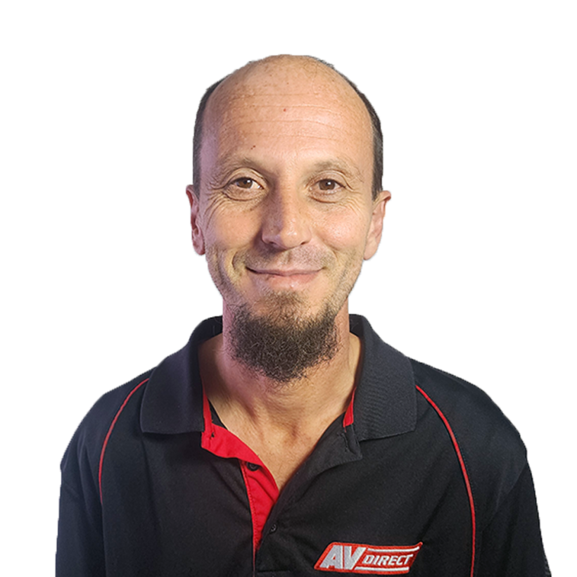AV Direct team member smiling in company polo shirt
