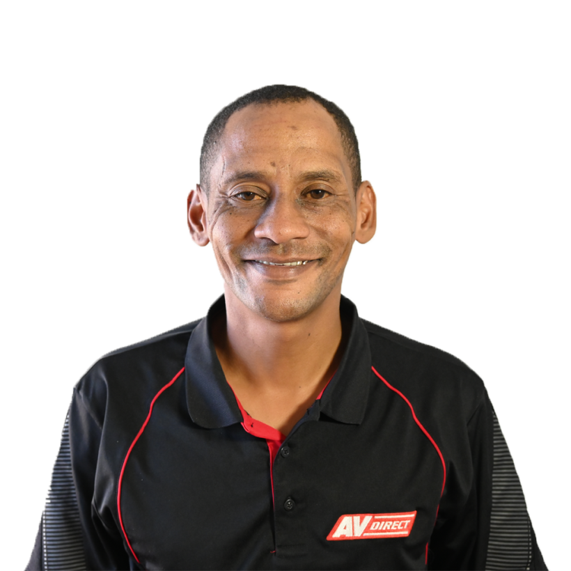 Smiling team member wearing AV Direct branded polo shirt
