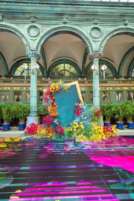 Colorful floral installation with a decorative frame