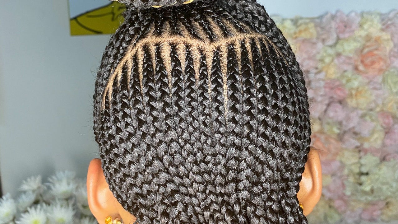 Close-up of an intricately braided bridal hairstyle.
