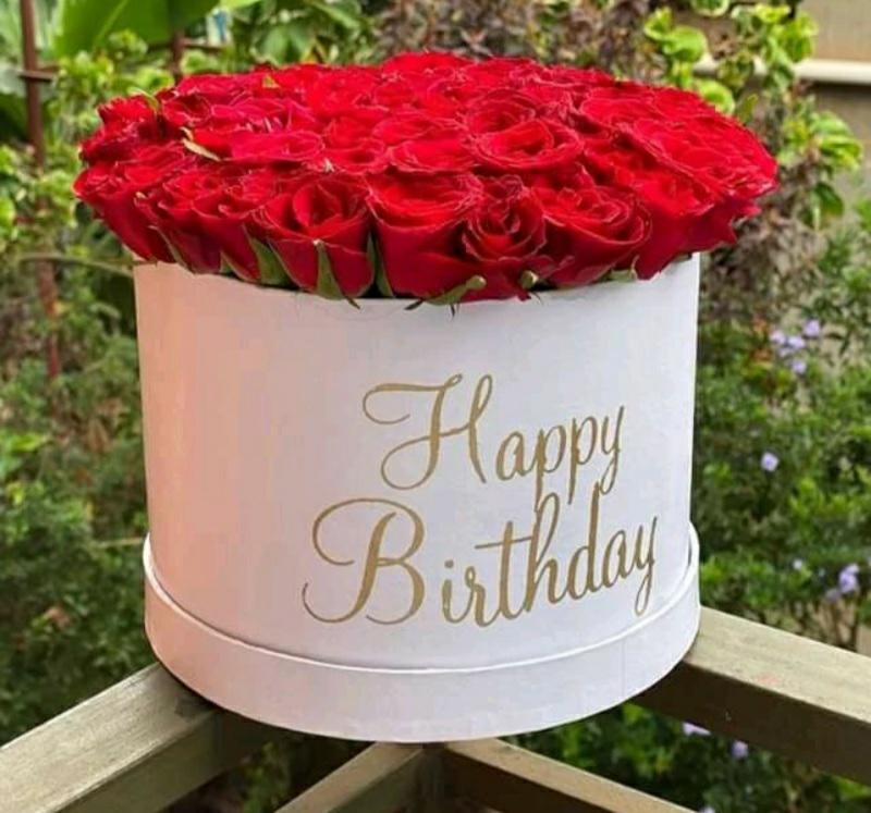 White box with red roses and 'Happy Birthday' text.