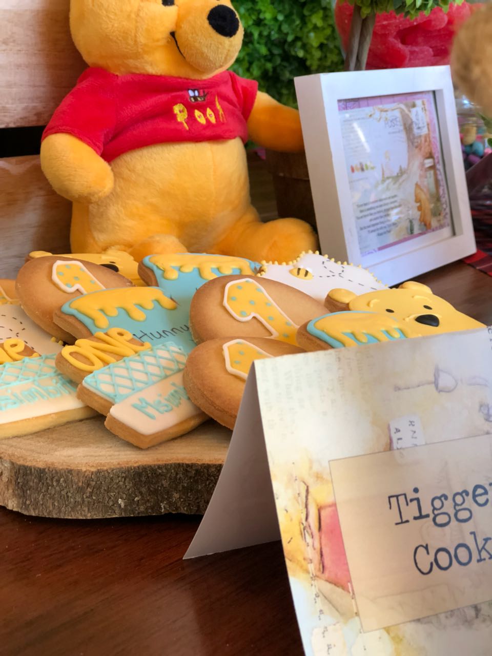Tigger-themed cookies displayed with a stuffed toy