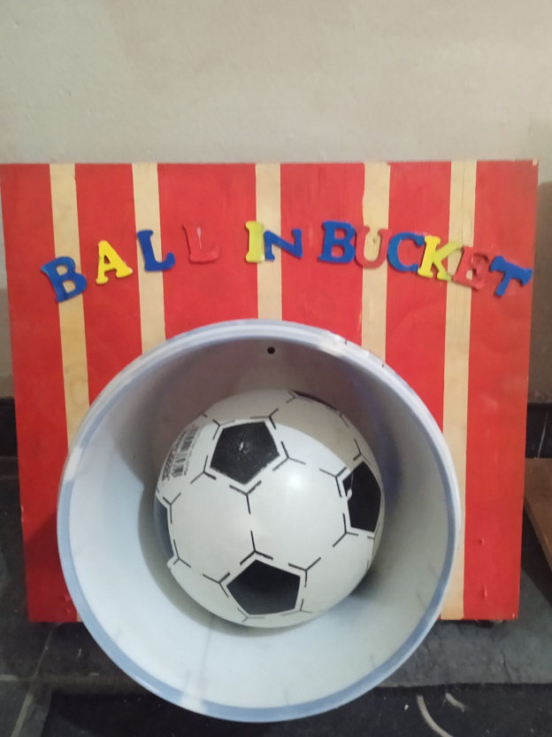 A Ball in Bucket game setup with a soccer ball.