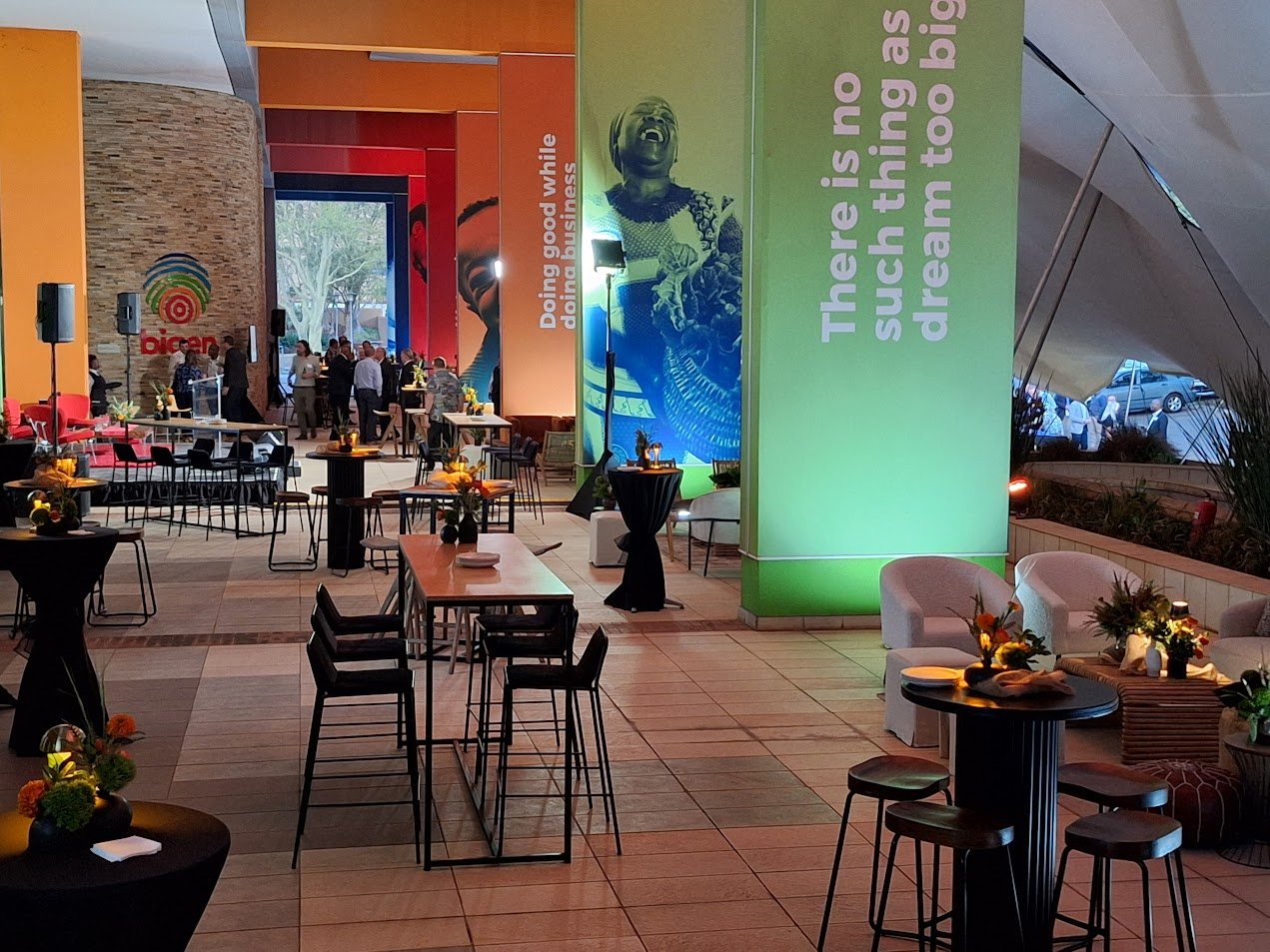 Event venue with arranged tables and vibrant decor