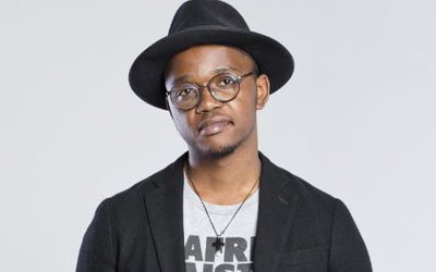 Portrait of a South African DJ in a hat and glasses