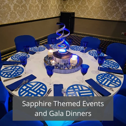 Table set with blue decor and geometric patterns for an event