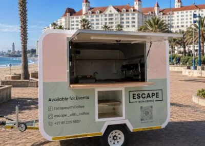 Coffee trailer with open hatch on beach promenade