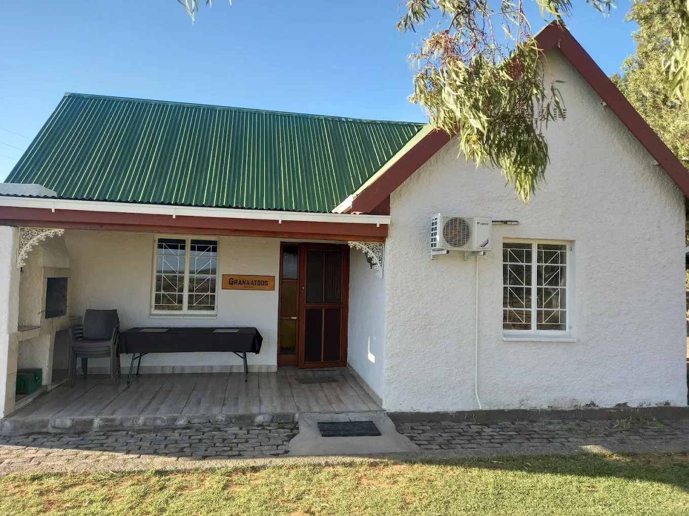 White chapel with a green roof and porch in KwaZulu-Natal