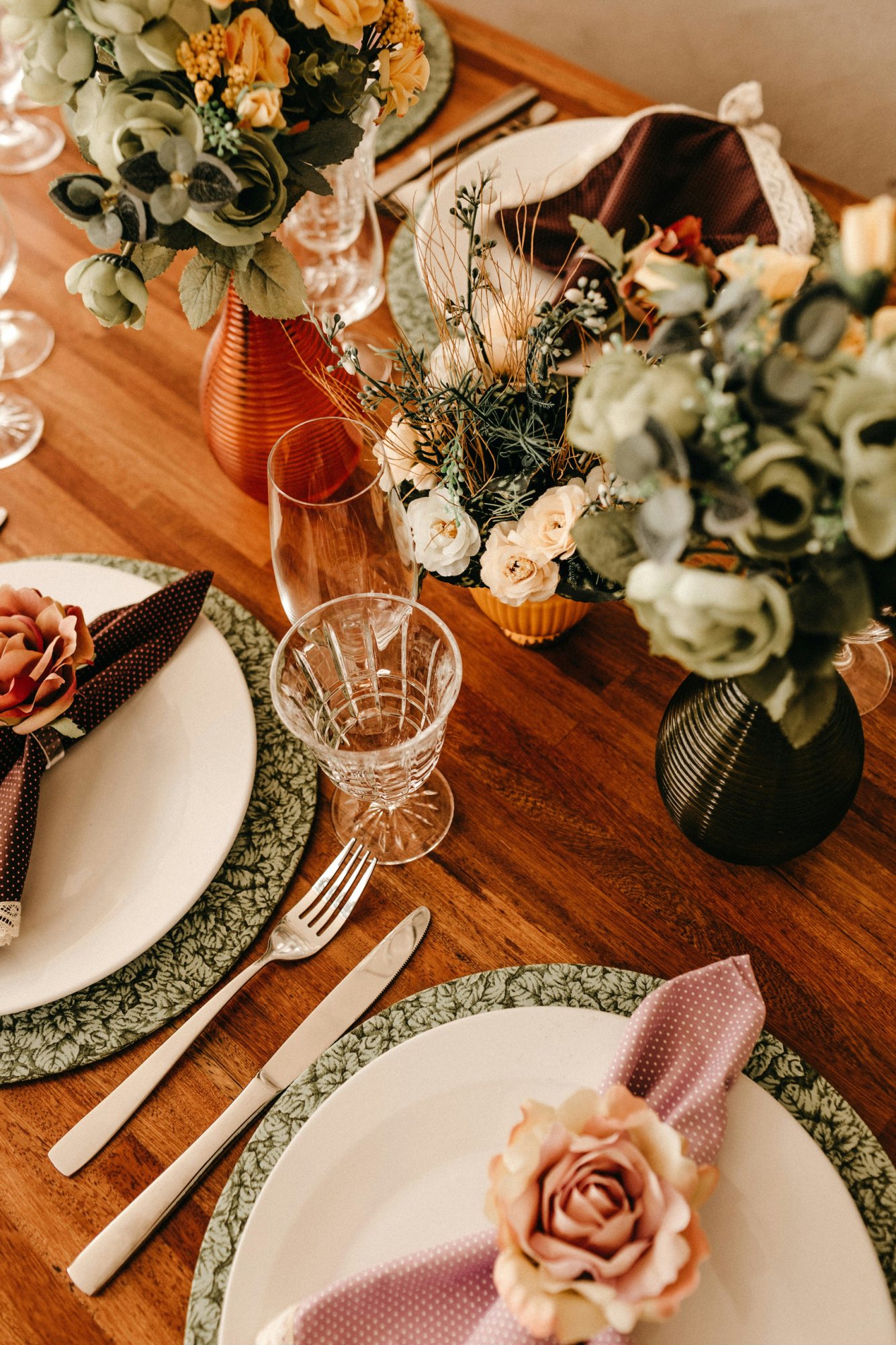 Artfully arranged table with flowers and decorative napkin