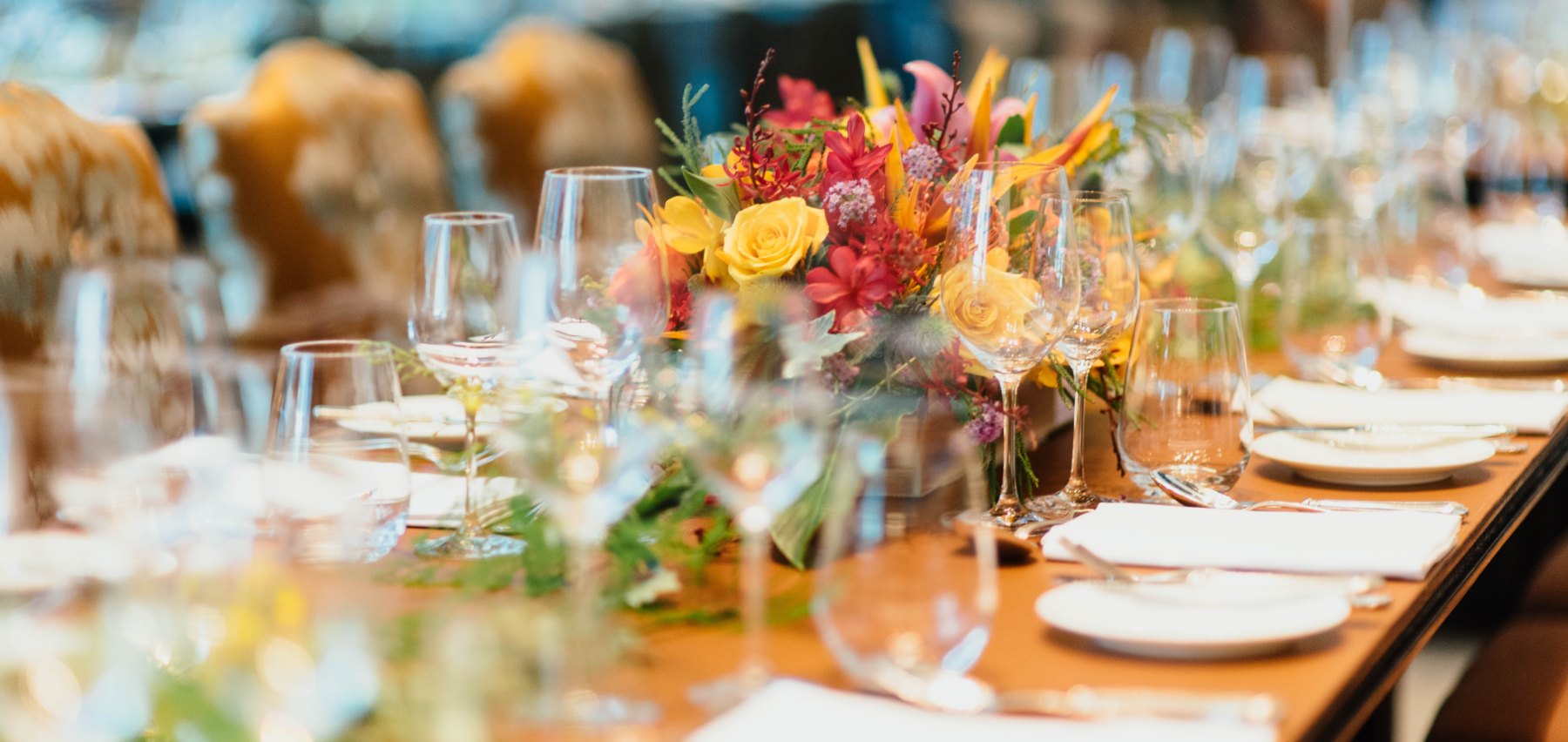 Table set with flowers and glassware for a formal event