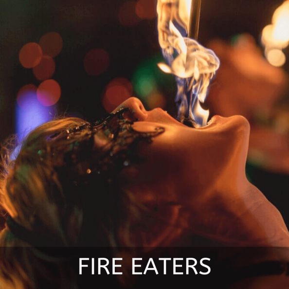 Fire eater showcasing a dramatic performance with flames