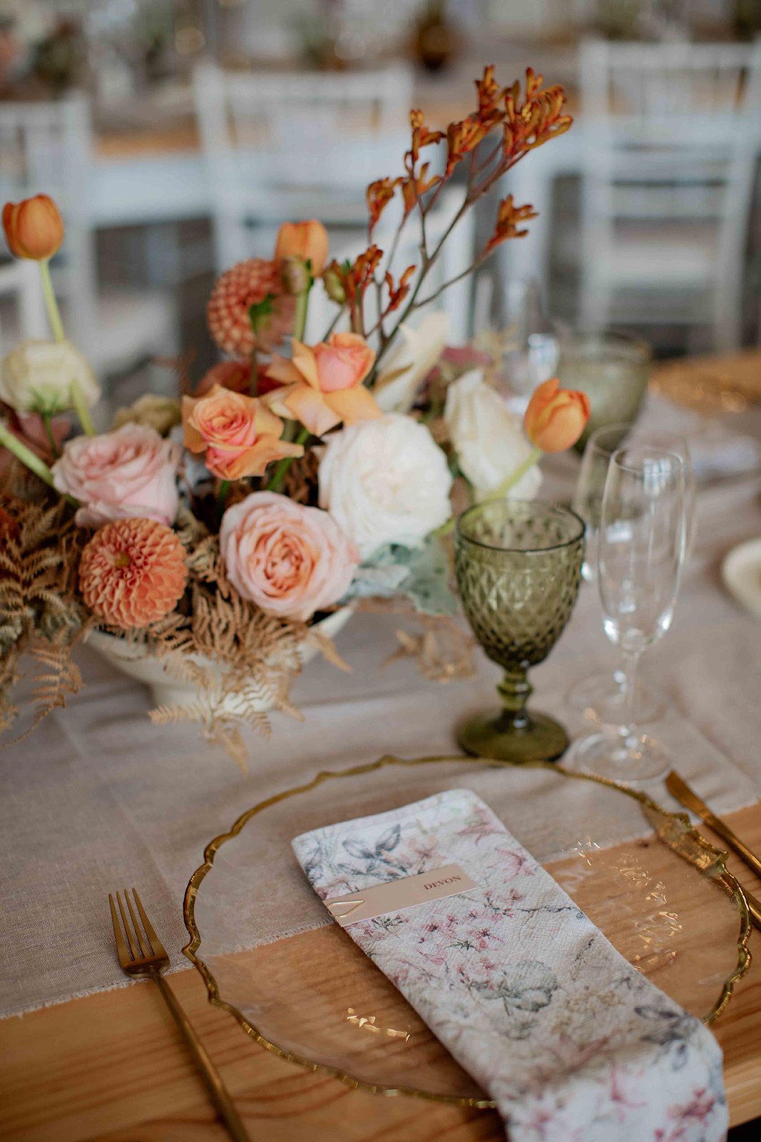 Floral centerpiece and elegant table setting with pastel colors