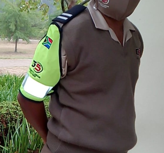 Security guard in uniform with G5 logo.