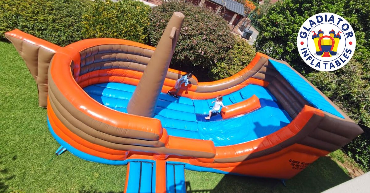 Children on a colorful inflatable pirate ship