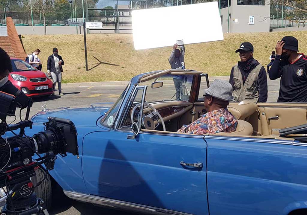 Vintage Mercedes Ponton during a film shoot with crew.