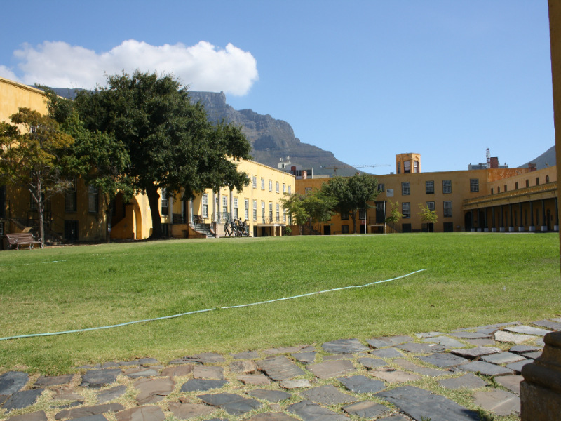 Inner courtyard of the Castle of Good Hope with yellow buildings