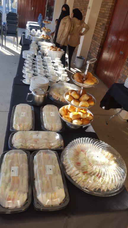 Table set with Halaal sandwiches and pastries