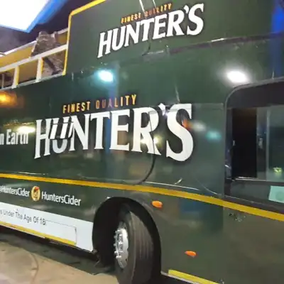 Branded open top party bus with Hunter's logo