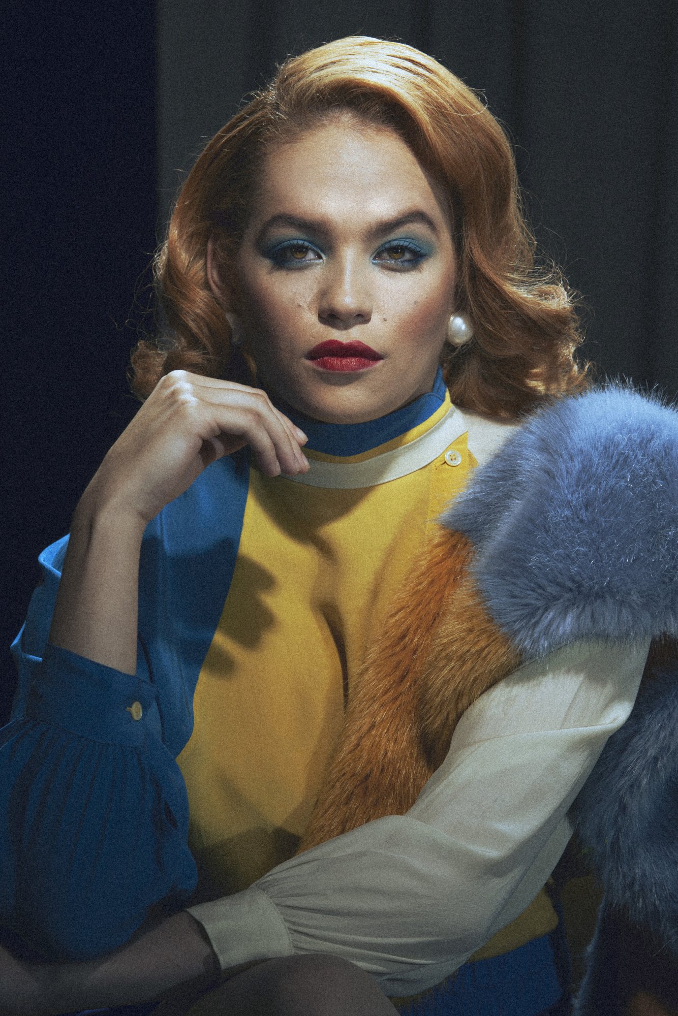 Close-up of a model with vintage makeup and styled hair