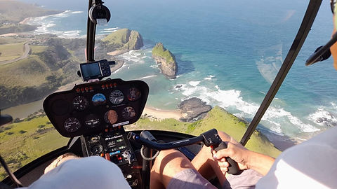 Cockpit view over a scenic coastline