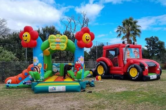 Tractor-themed inflatable play area for kids
