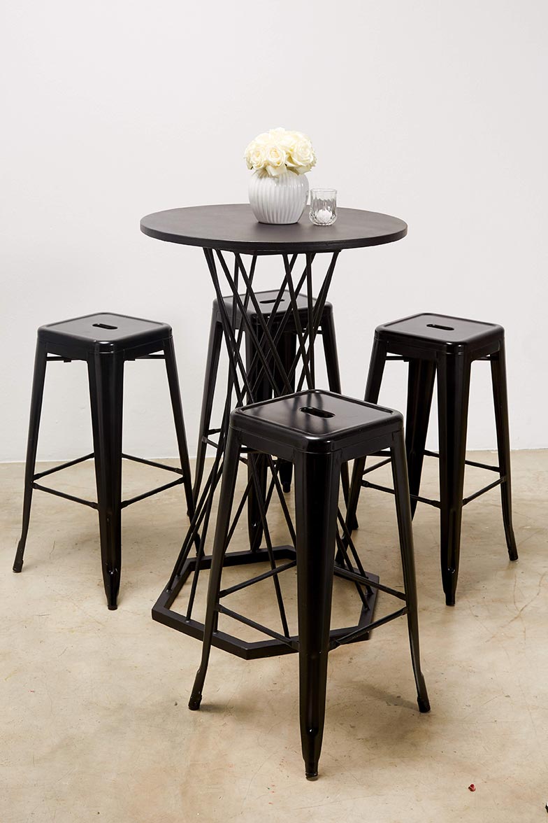 High table and stools arranged for an event setup