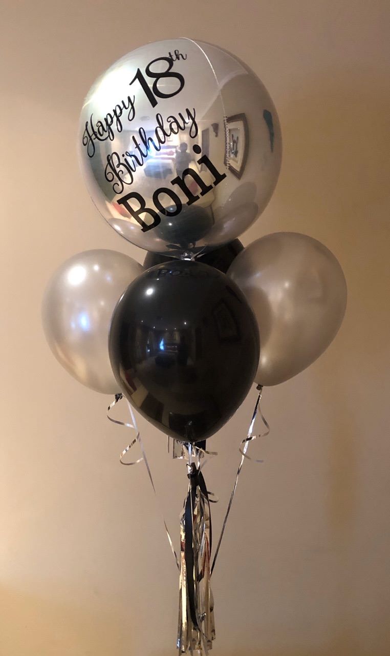 A custom balloon bouquet for a birthday celebration.