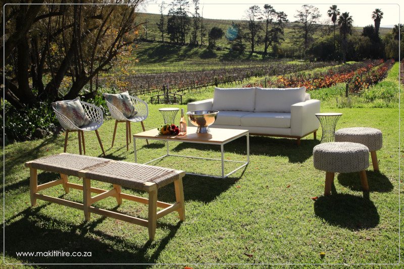 Outdoor lounge area with seating and decor