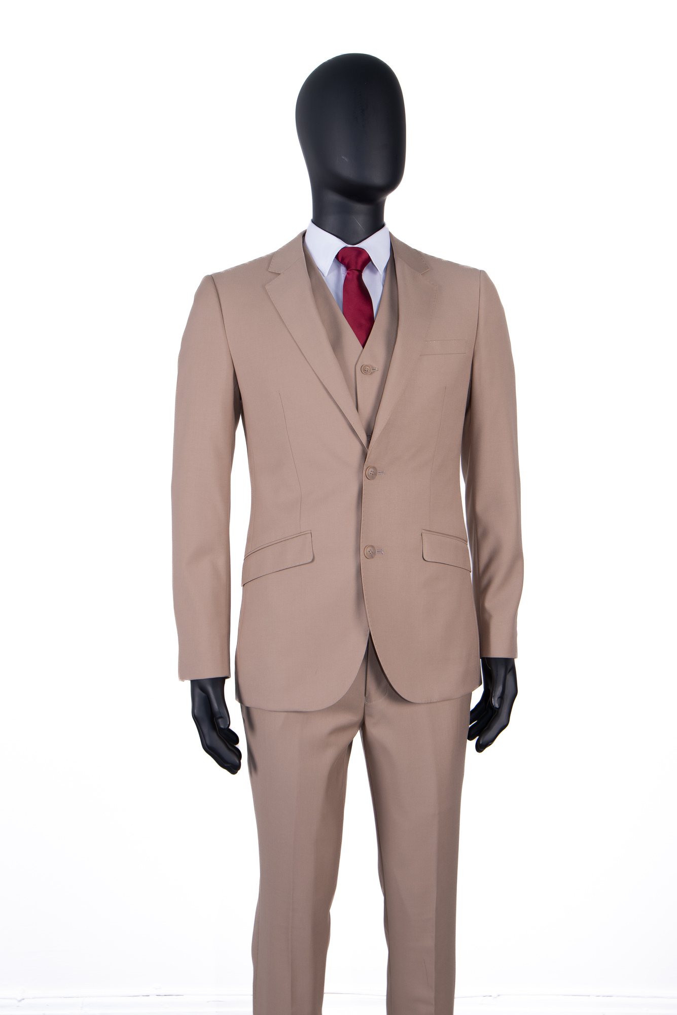Beige suit with vest and red tie on mannequin.