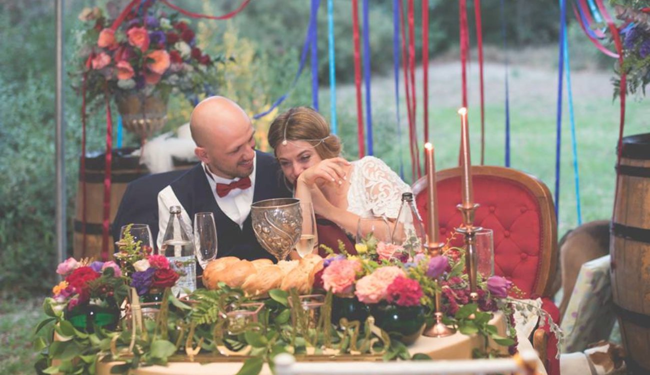 Intimate vintage-inspired table setup with floral arrangements