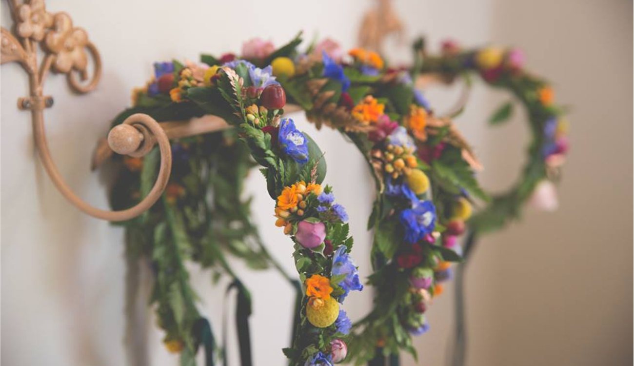Colorful floral crowns beautifully arranged on a display