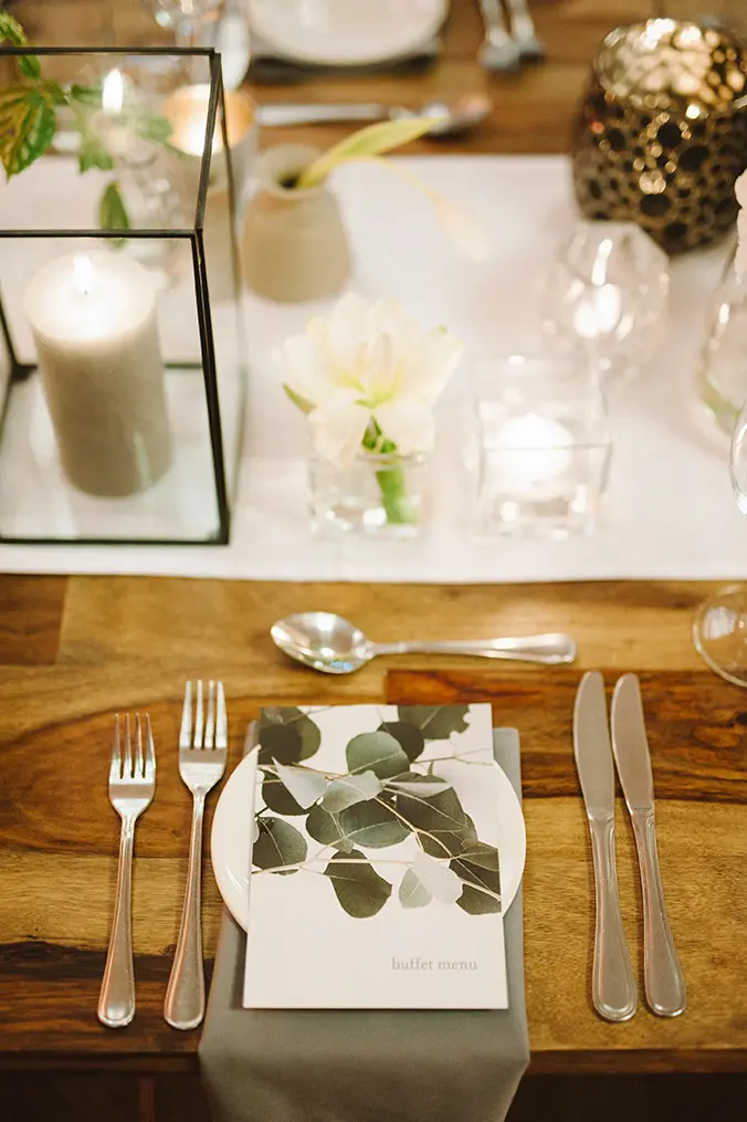 Buffet table with menu and floral decor