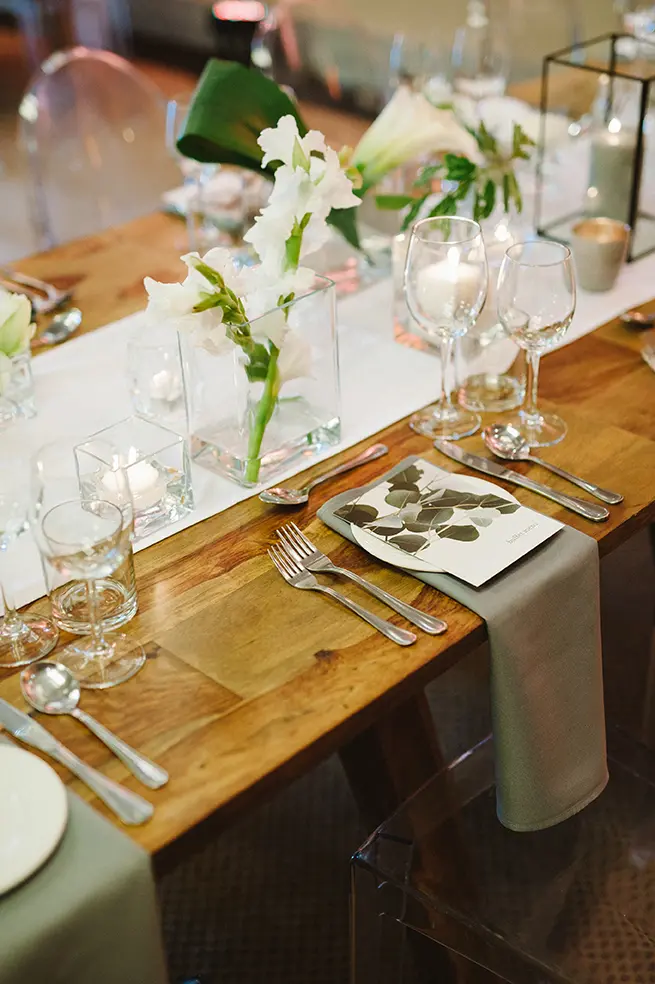 Elegant table setting with flowers and glassware