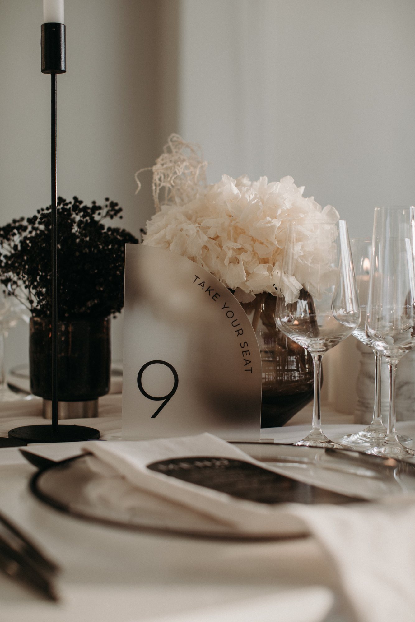 Table number 9 with a floral centerpiece