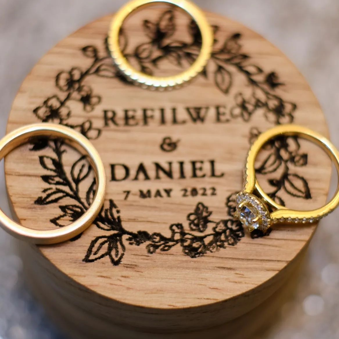 Wooden ring box with engraved names and date