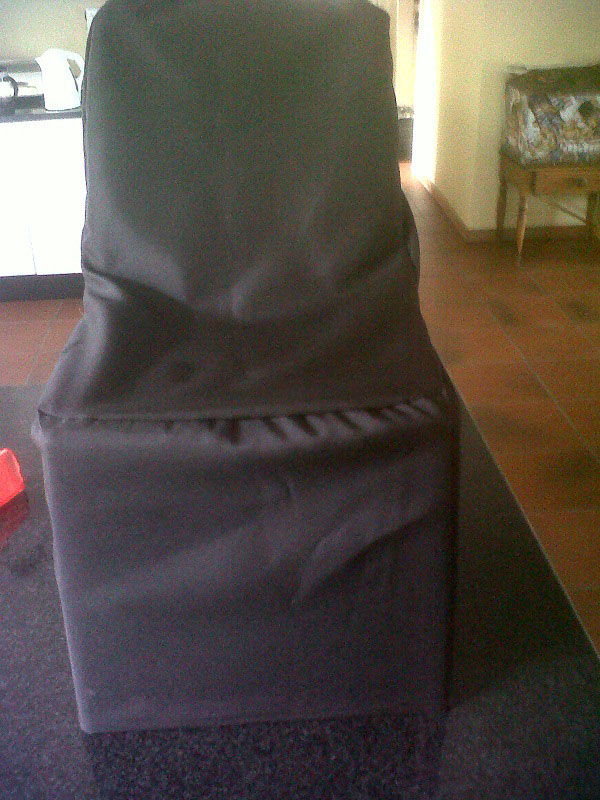 Black chair cover on a standard chair