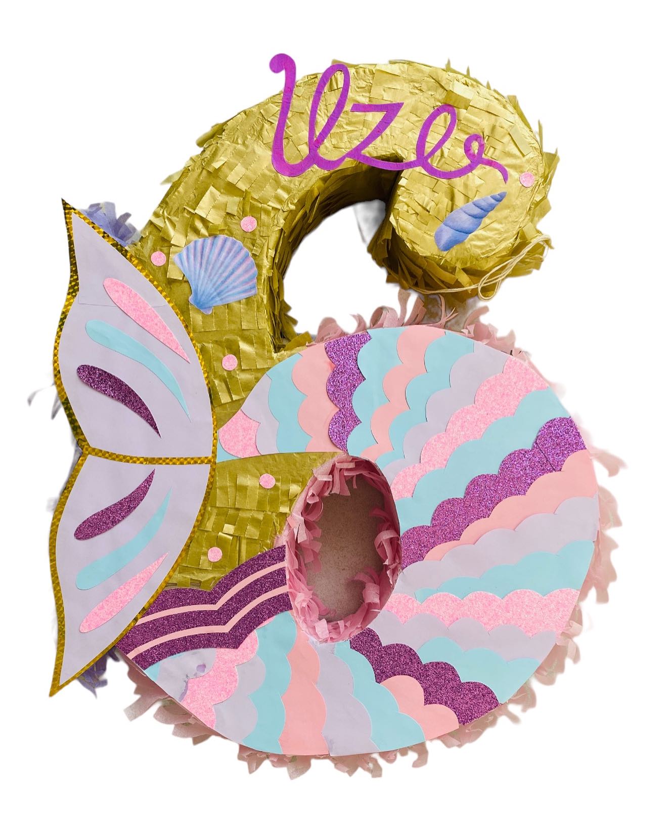 Handcrafted mermaid-themed piñata in pastel colors
