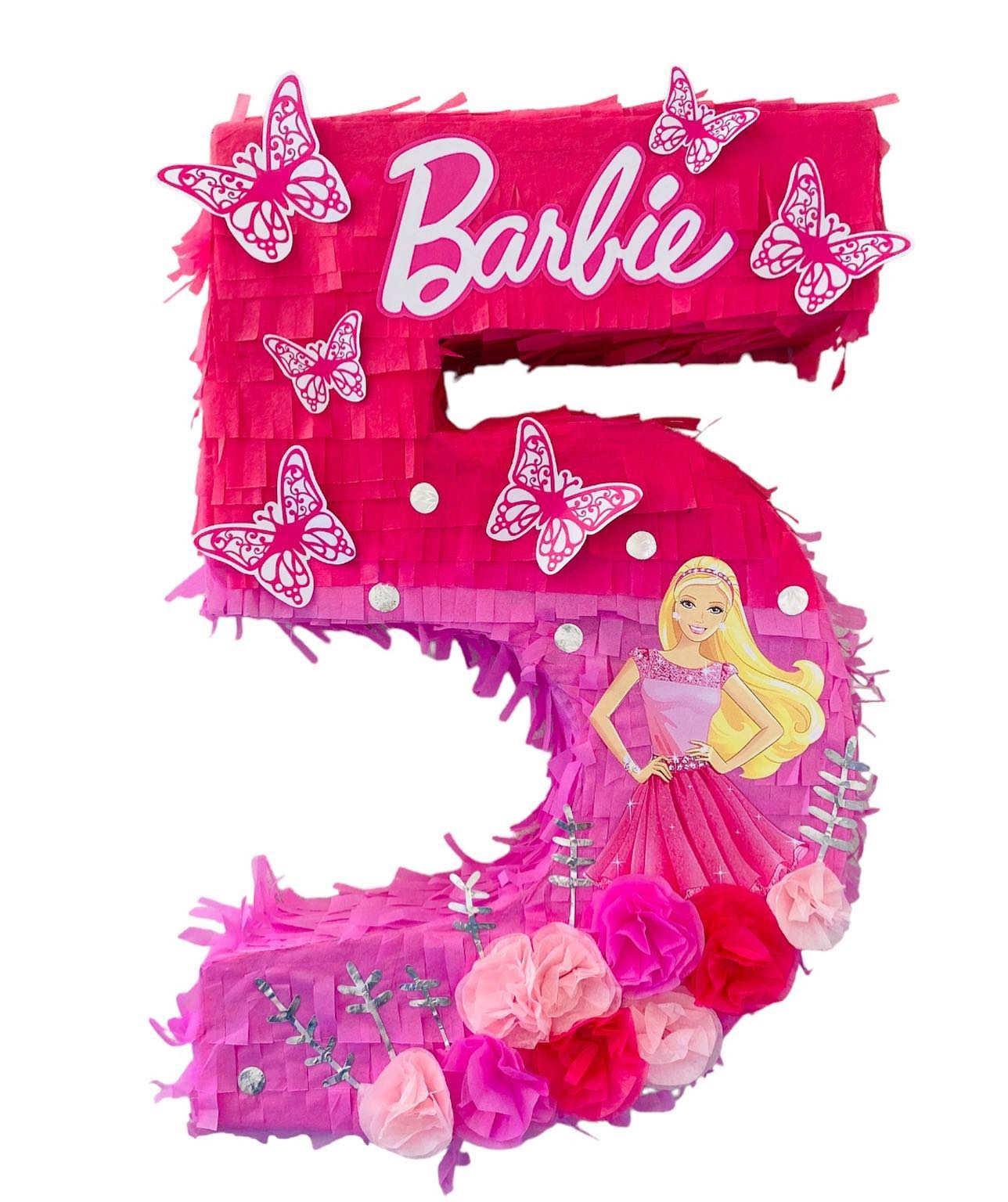 Custom Barbie piñata shaped as number five with pink decorations