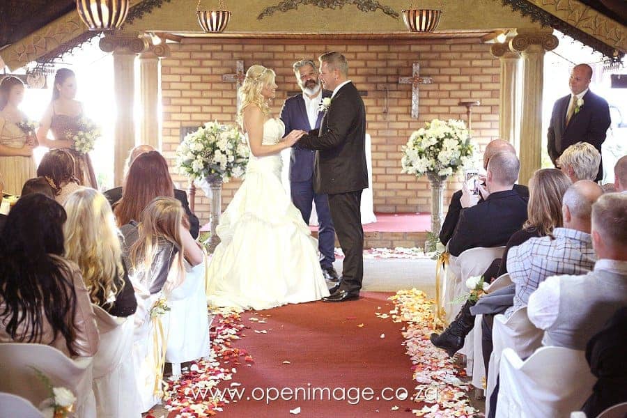 Couple exchanging vows during a wedding ceremony
