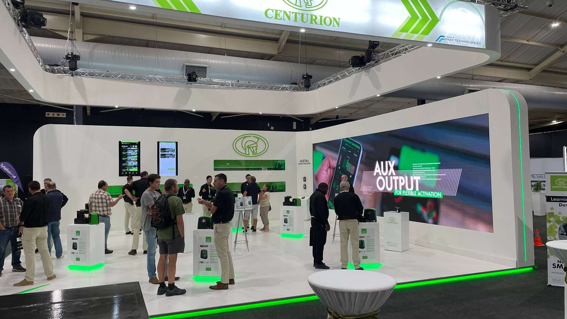 Modern event setup with digital screens and seating