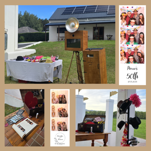 Vintage photo booth setup with props and photo strips.