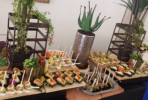 A selection of diverse halaal platters beautifully arranged with garnishes and decorations.