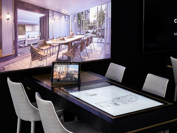 Touchscreen table with a high-definition display behind it