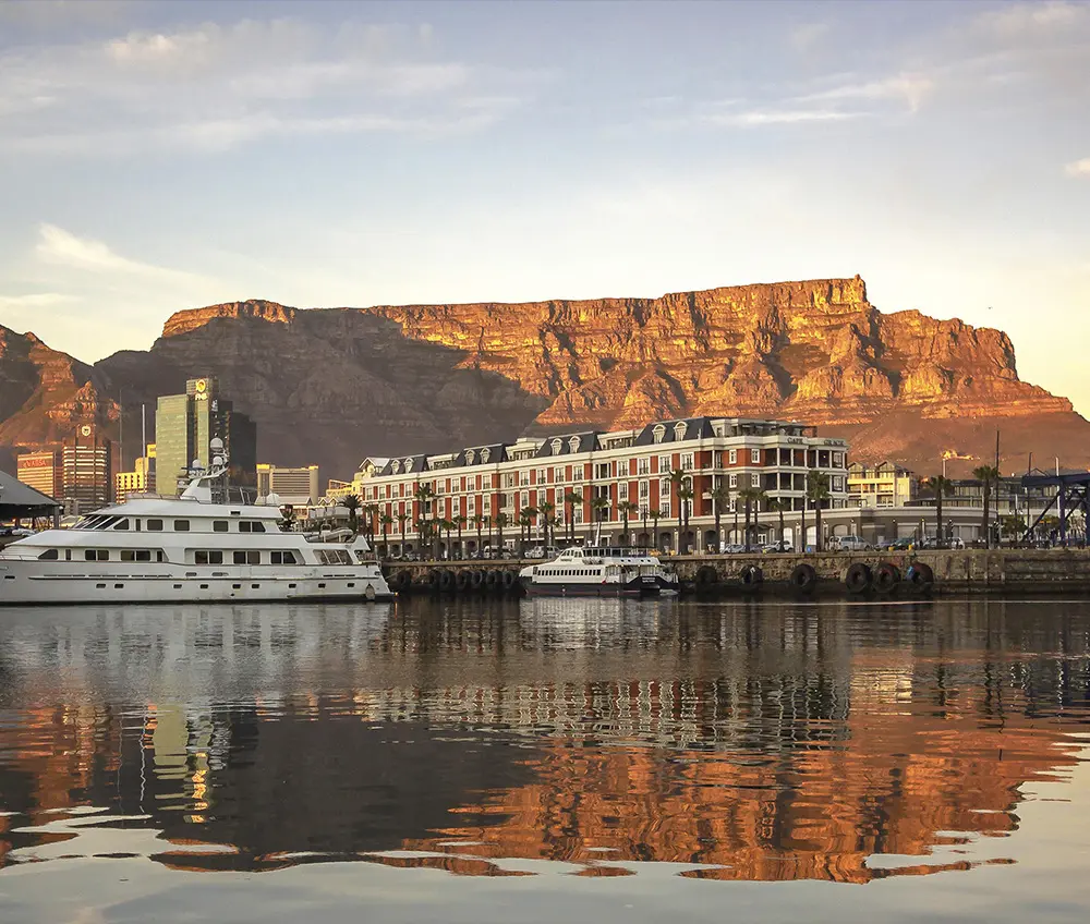 Waterfront scene in Cape Town with Table Mountain reflection