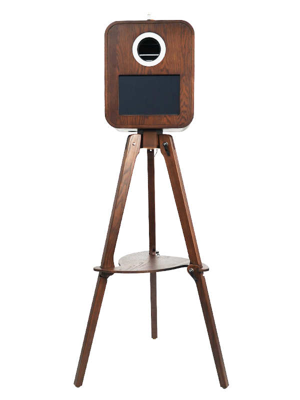 Wooden photo booth on a tripod with a circular lens.