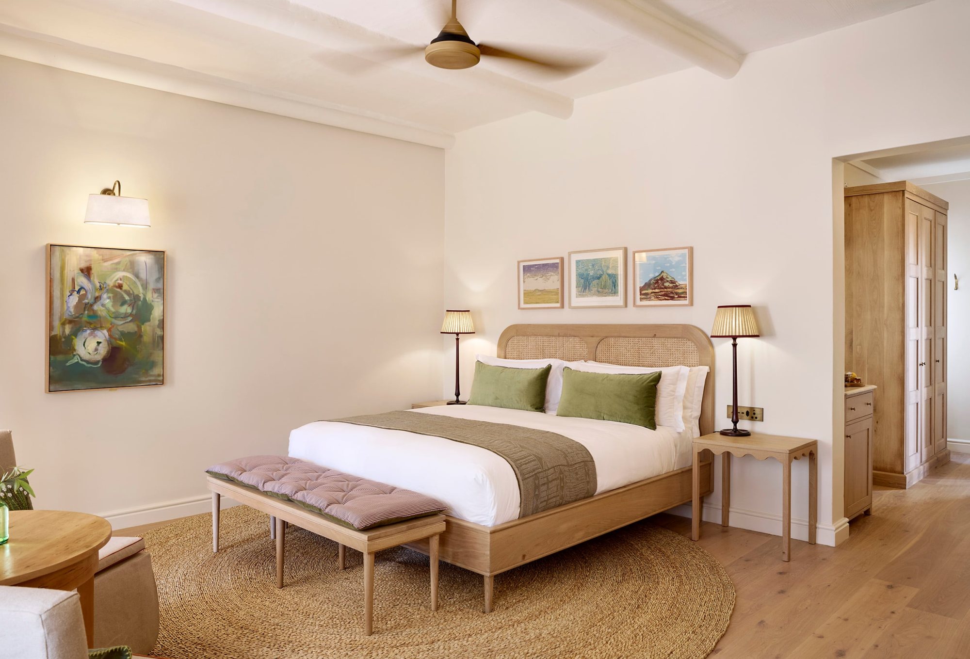 Stylish hotel room with a cozy bed and natural decor