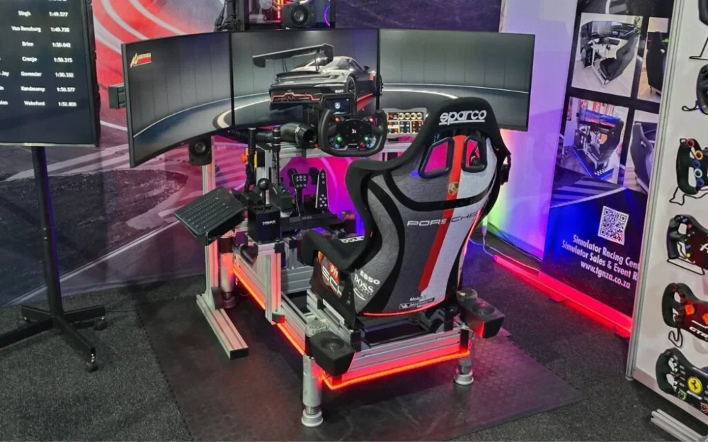 High-quality racing simulator with multiple screens and racing seat.