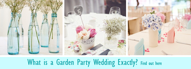 Vintage glass bottles with flowers on a wedding table