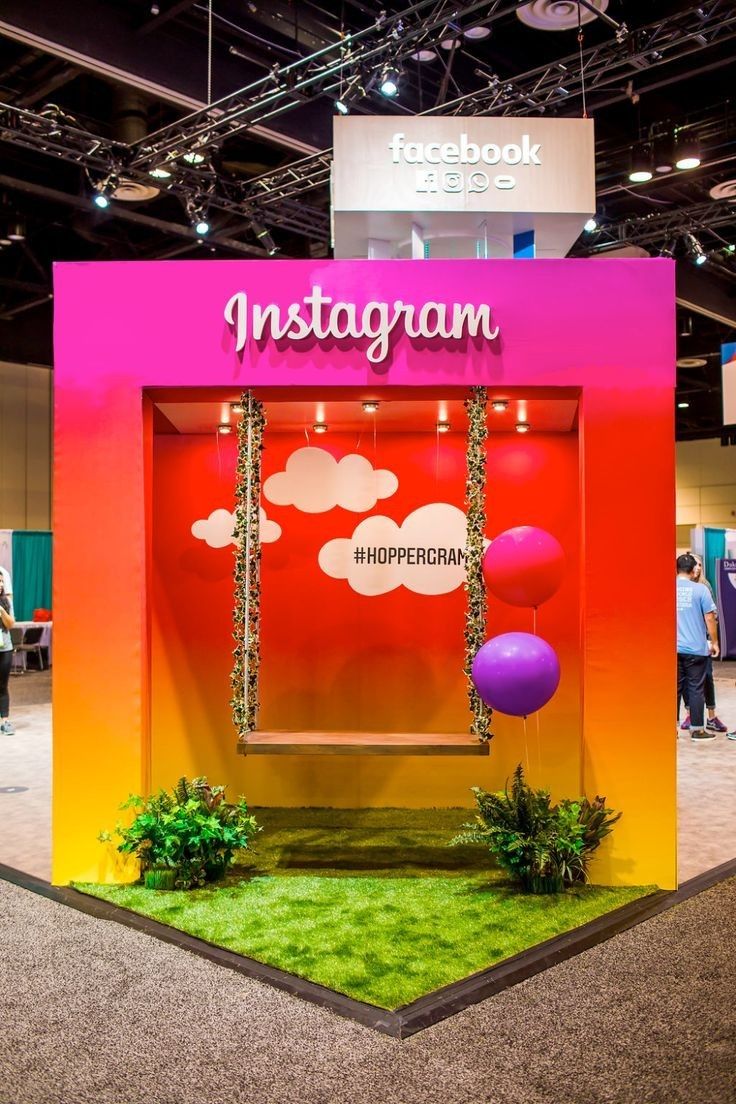 Colorful Instagram-themed photo booth with clouds and grass