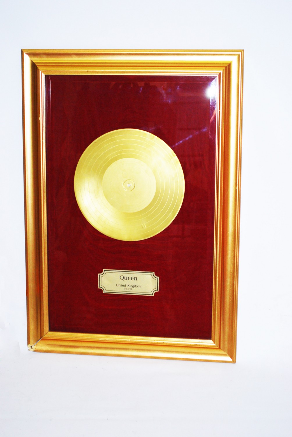 Framed gold record plaque for Queen
